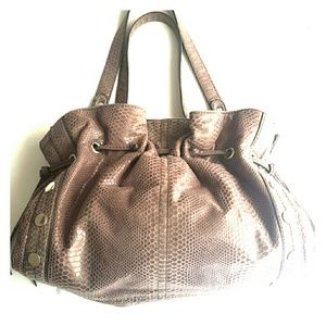 Nine West ,Tan snakes skin ,shiny hand bag